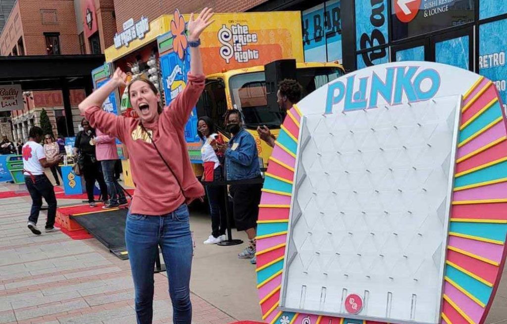 Woman jump playing plinko